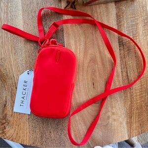 Thacker Red neoprene Crossbody phone Bag
NWT